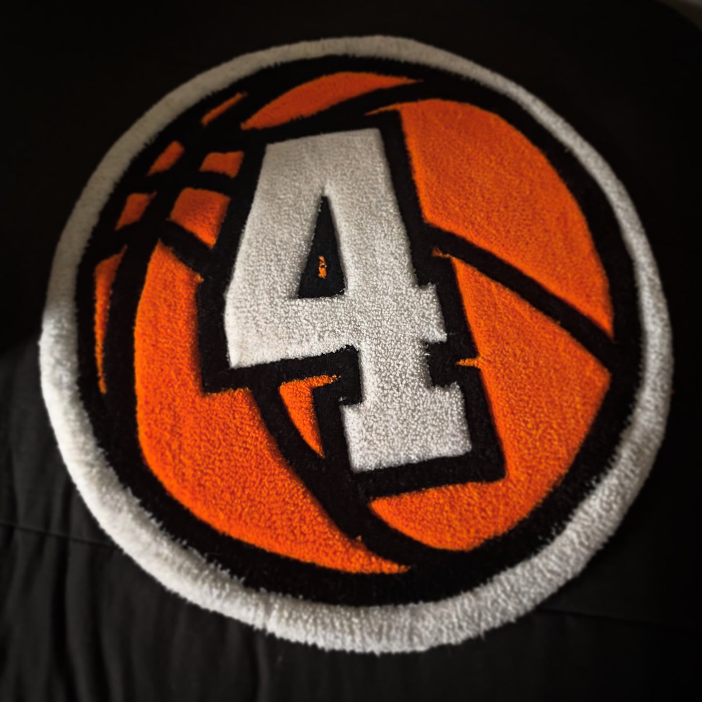 Basketball Rug with number 4 on a black background