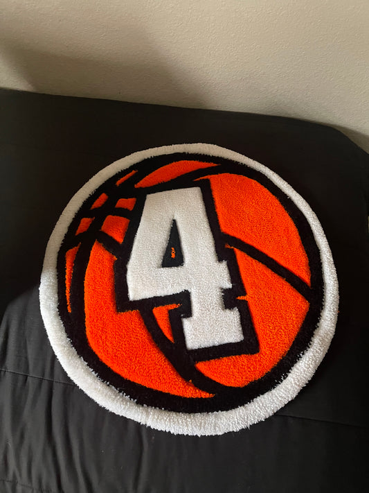 Basketball-themed rug with number 4 on a black background